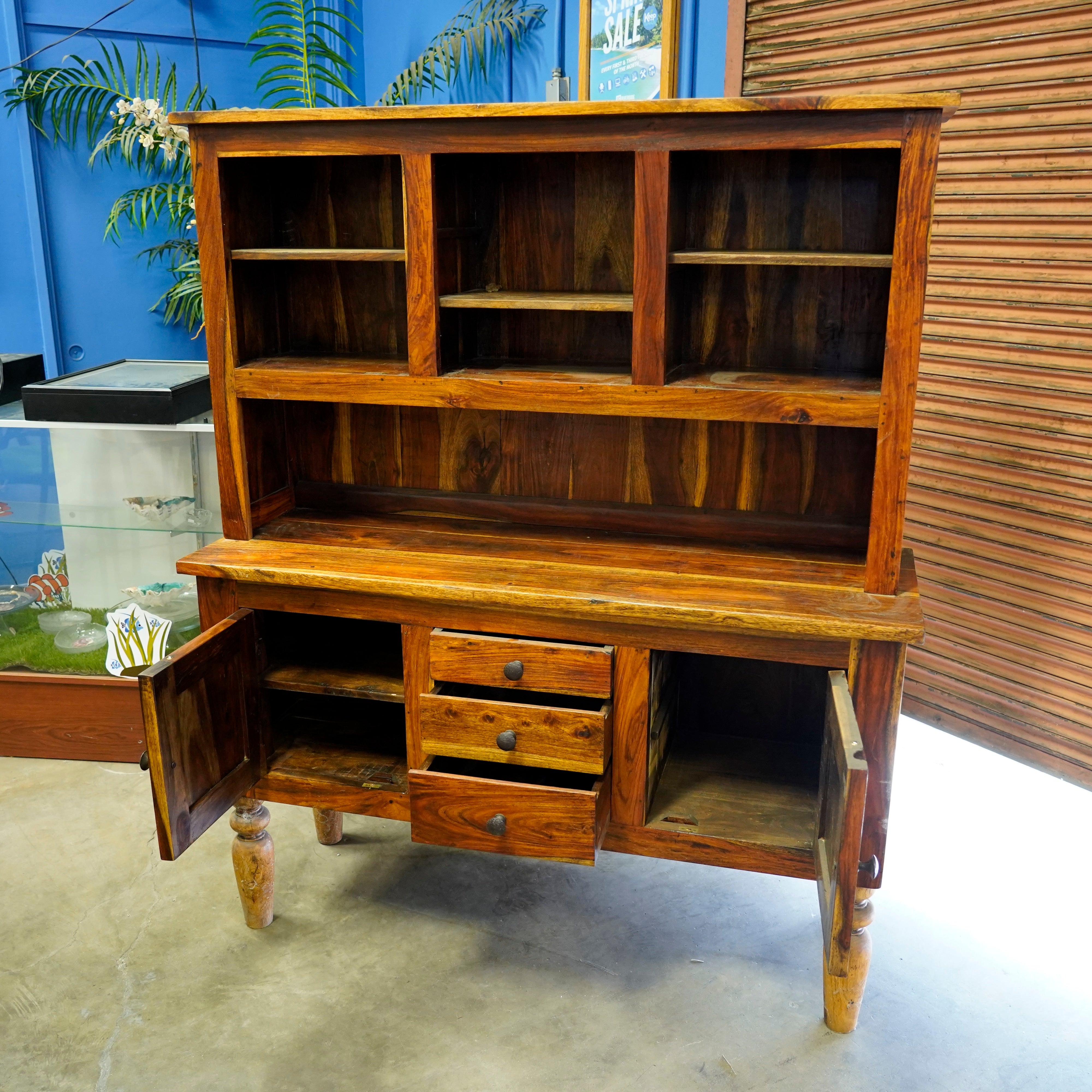 A vintage wooden display cabinet for showing off all your new finds.
