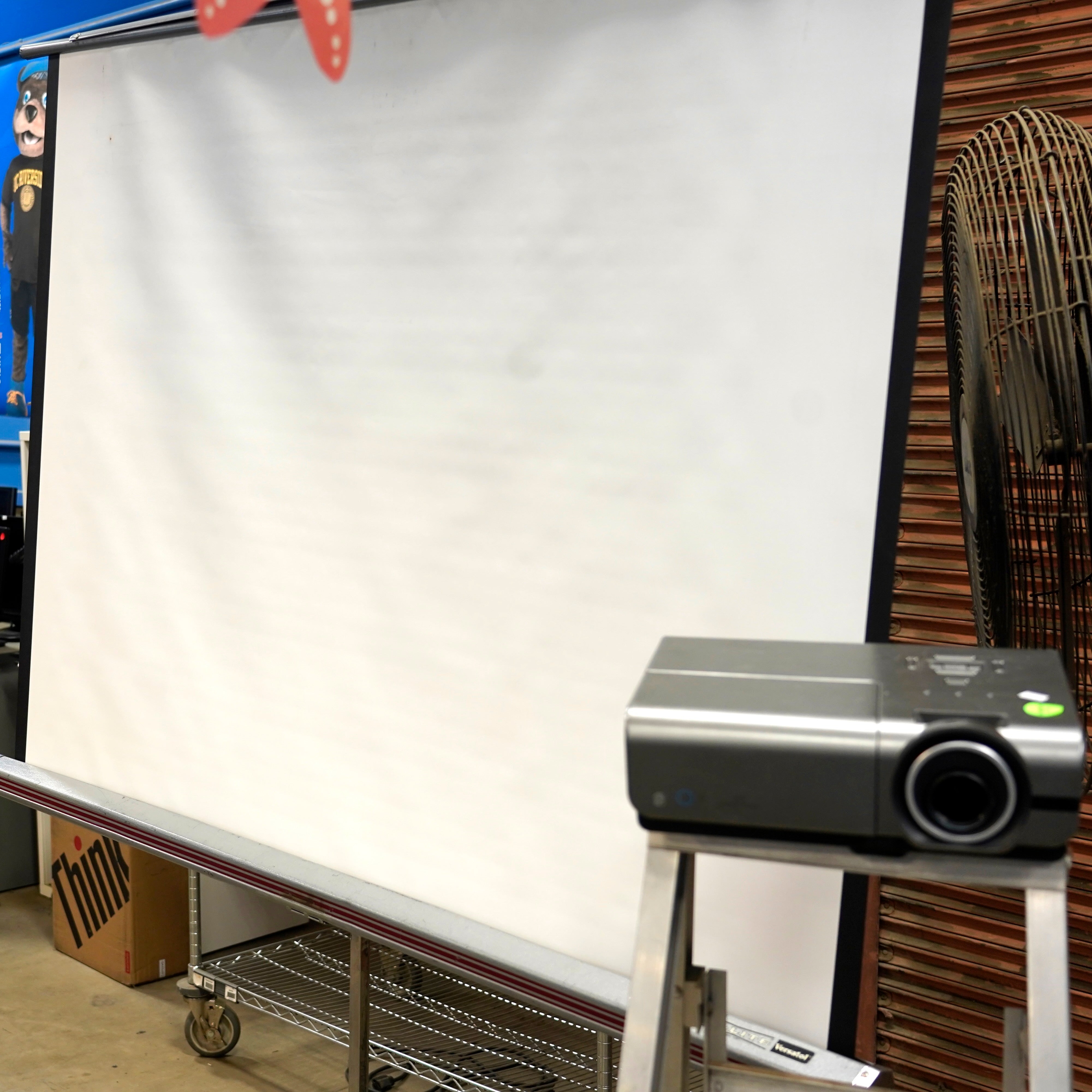 A projector and screen for summer movie nights.