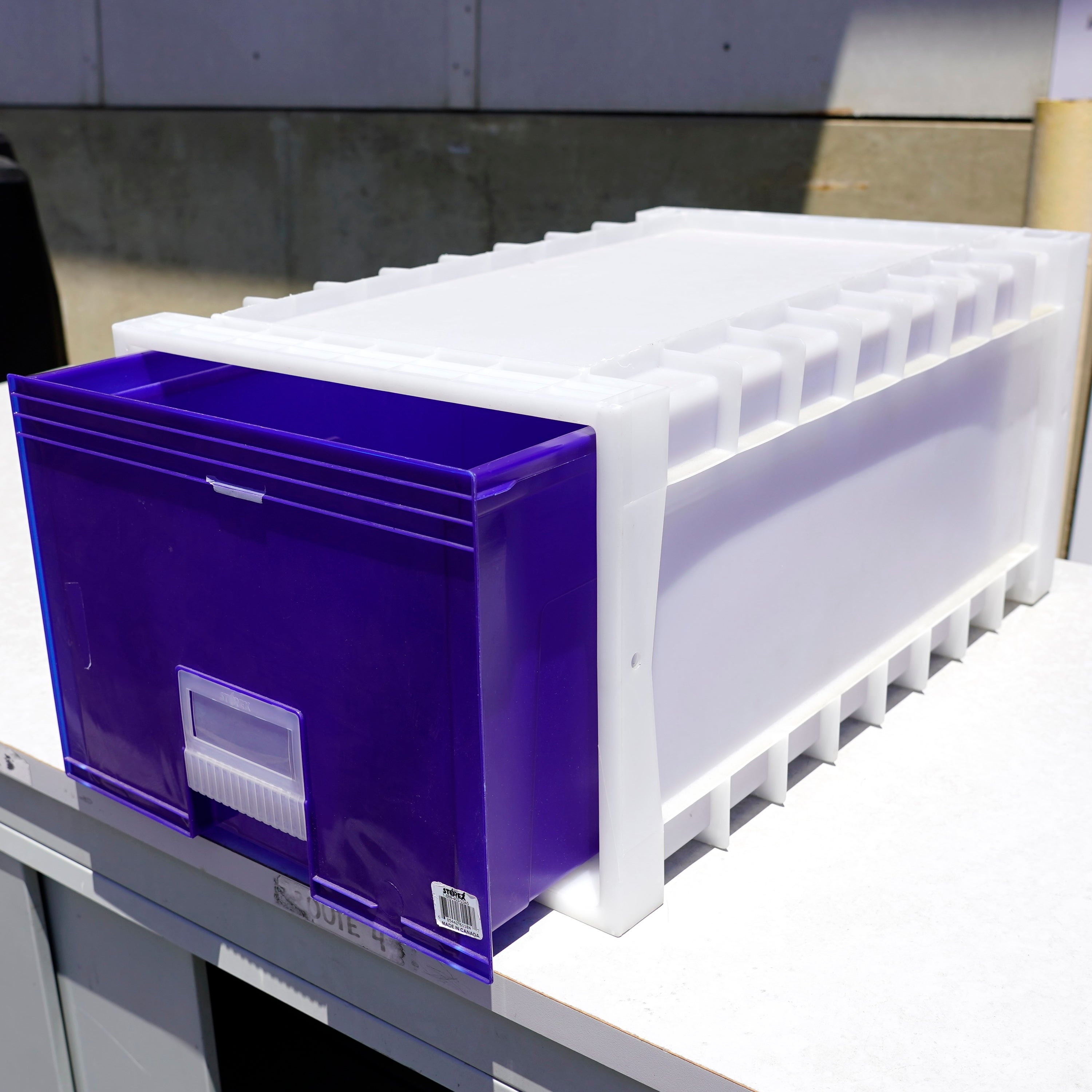 Plastic blue-and-white storage drawers