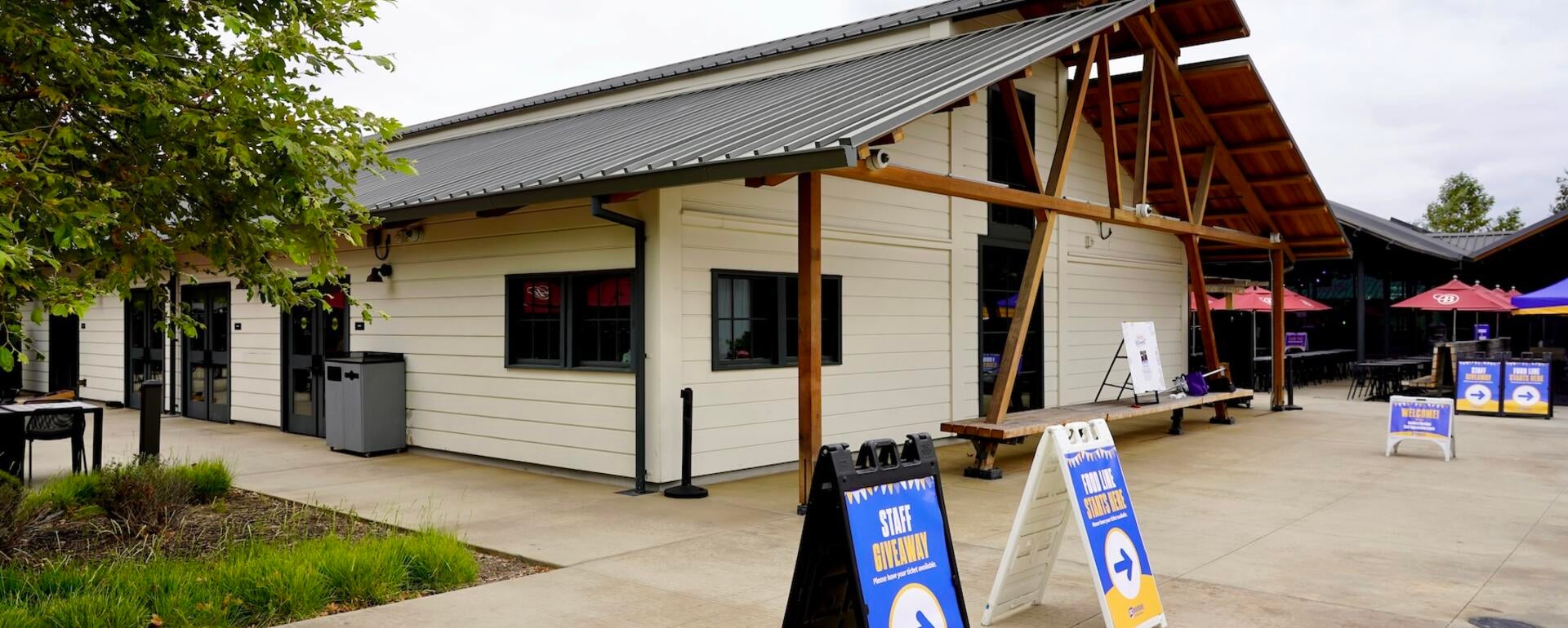 The exterior of the Barn with staff appreciation wayfinding signs.