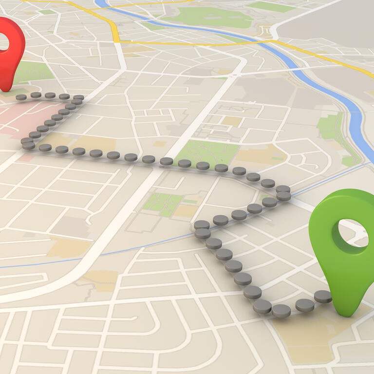 Map showing a route between a red and green location indicator.