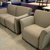 Brown wingback chairs, including one single-seater and one connectable sofa.